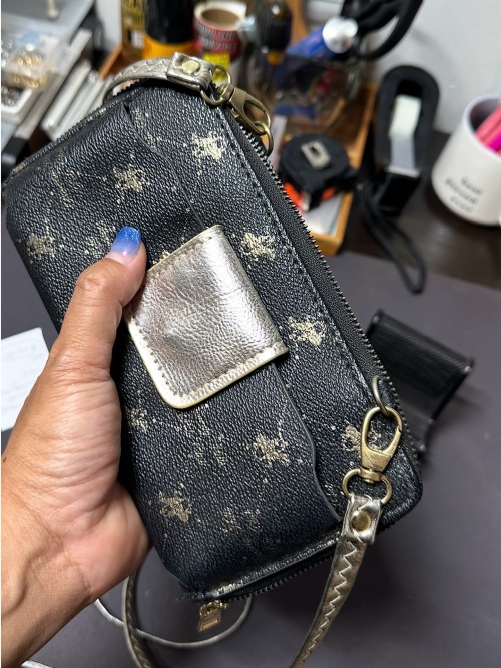 Compact Black Crossbody Wallet with Metallic Accents